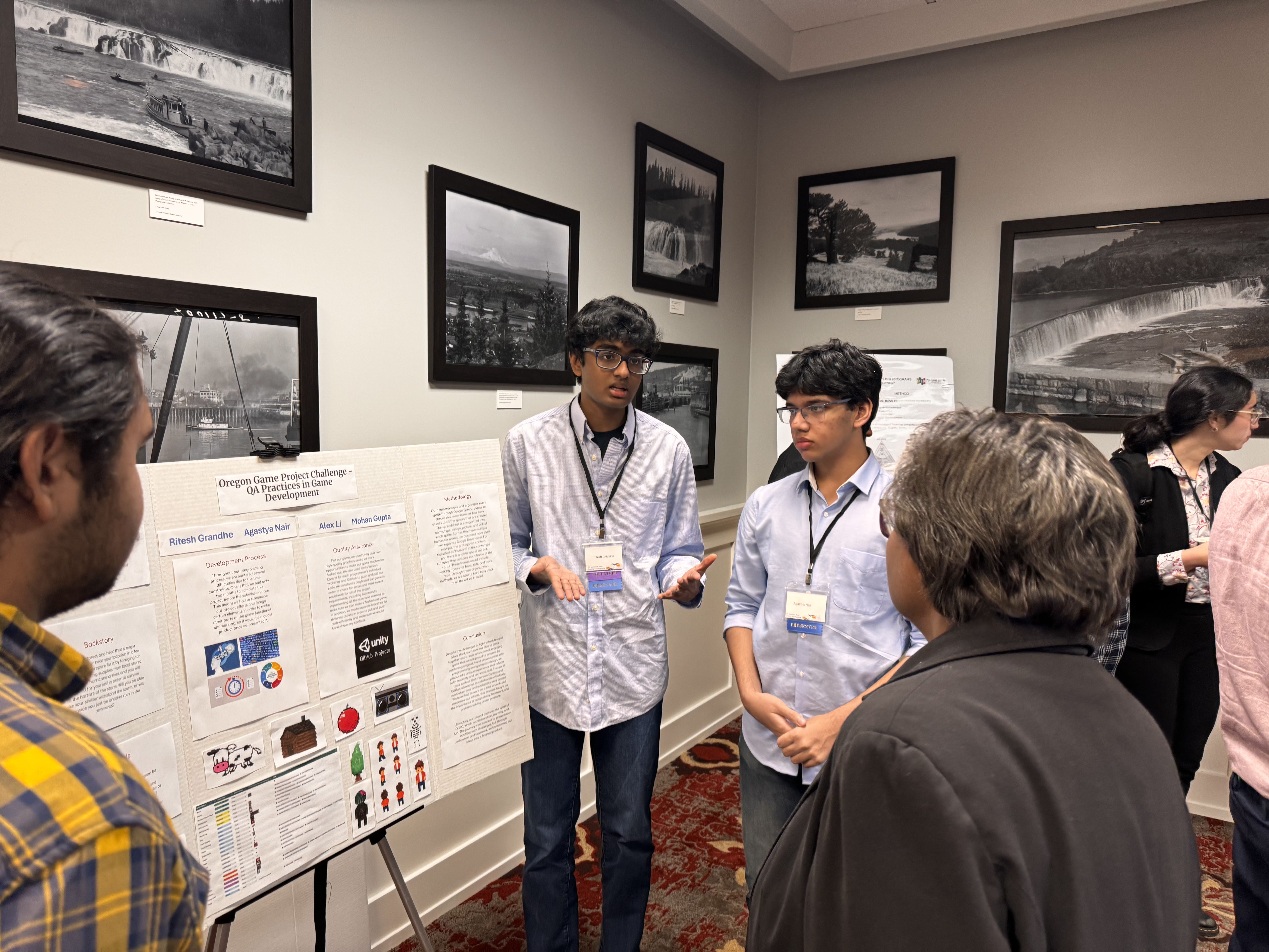 Attendees discussing a poster paper presentation