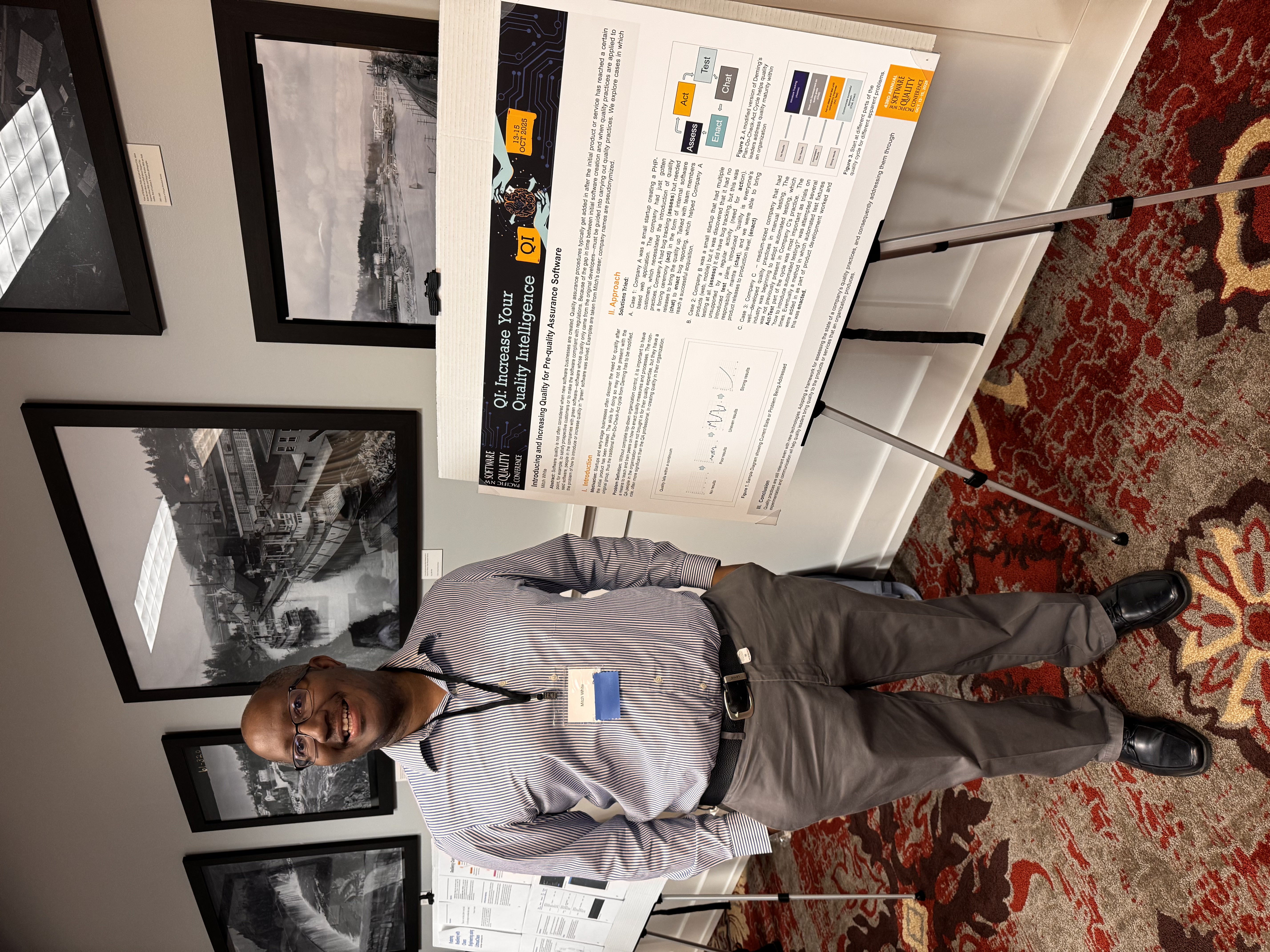 A sample PNSQC poster paper displayed on an easel
